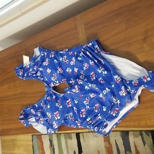 Brand new one piece bathing suit with keyhole and flutter sleeves